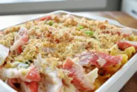 Baked Crab Rangoon Casserole with creamy crab and noodle layers topped with golden parmesan panko crust — a comforting twist on Crab Rangoon Pasta perfect for easy weeknight dinners.