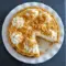Slice of Amish Peanut Butter Cream Pie topped with whipped cream and peanut butter crumbles on a flaky crust, a creamy Peanut Butter Cream Pie style Pie Dessert perfect for fans of Amish Recipes.