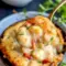 Golden baked Cheddar Bay Biscuit Seafood Pot Pie fresh from the oven, a creamy Seafood Pot Pie topped with fluffy Cheddar Bay Biscuits, perfect for a cozy Seafood Dinner and hearty Fish Dishes.