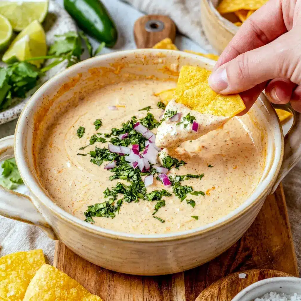 Creamy Cottage Cheese Queso topped with jalapeños and cilantro, served as a flavorful Southwest Queso and healthy Cottage Cheese Cheese Dip for taco night.