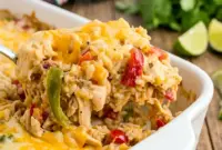 Cheesy baked Chicken Fajita Casserole filled with shredded chicken, rice, peppers, onions, and melted cheese in a cozy Tex-Mex dish. Perfect for an easy Chicken Fajita Casserole With Cheese dinner or comforting Fajita Chicken Casserole Recipe.