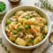 Creamy One Pot Gnocchi Chicken Pot Pie served in a cozy skillet with tender chicken, vegetables, and soft gnocchi, perfect for Fan Favorite Dinners and comforting Cozy Meal Ideas.