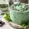 Rich Mint Chocolate Chip Cake layered with creamy green buttercream, chocolate chunks, and moist chocolate cake for the ultimate dessert. Perfect for a festive Mint Chocolate Cake Birthday celebration or indulgent Mint Chip Cake recipe inspiration.