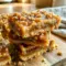 Golden buttery Caramel Crush Bars layered with gooey caramel filling and oat crumble topping, perfect for rich Caramel Desserts and easy Dessert Bars.