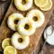 Soft and citrusy Lemon Vanilla Protein Donuts with Glaze topped with creamy icing, perfect for a High Protein Donut Recipe and healthy Glazed Protein Donuts breakfast treat.