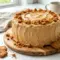 Moist layered Biscoff Cake with creamy cookie butter frosting and Lotus cookie crumbs, perfect for Decadent Birthday Cakes and irresistible Biscoff Cakes lovers.