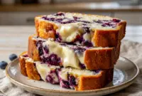 Blueberry Cream Cheese Bread looks so soft and inviting in this cozy loaf shot, with a tender crumb that highlights Baking Cream Cheese for a rich bakery-style finish.