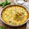Freshly baked Green Chile Chicken and Rice Casserole topped with melted cheese and herbs, a comforting Green Chili Chicken Casserole With Rice perfect for easy family dinners.