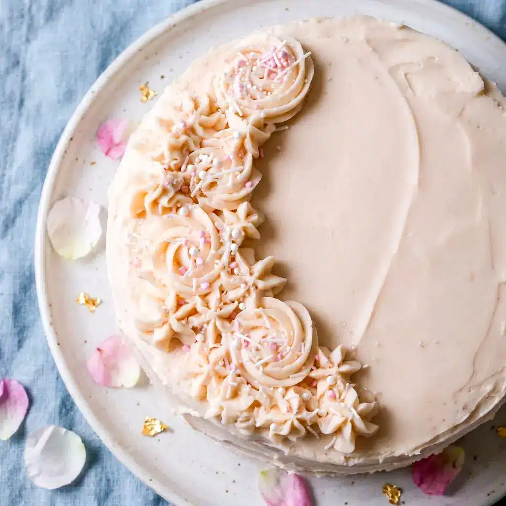 Elegant Pink Champagne Cake with delicate pink layers and a beautiful Cake With Pink Icing, perfect for Womens Birthday Cakes and Pretty Cakes For Women Birthdays.