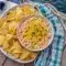 Boat Dip served in a colorful bowl with tortilla chips, a crowd-pleasing Rotel Boat Dip Recipe for easy summer snacking.