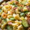 Dill Pickle Bacon Pasta Salad in a creamy serving bowl, a tasty pick for Pasta Salad Recipes Dill Pickle fans who love bold flavor.