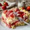 Strawberry Cheesecake Dump Cake with creamy layers and juicy strawberries, perfect for Mother S Day Dessert Ideas and spring celebrations.